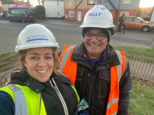 Cara with Billy working on DIY SOS Big Build Kettering 